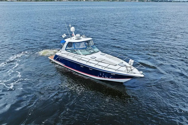 Slide: The Image of 2008 Formula 40 Performance Cruiser navigating on open water. - 27