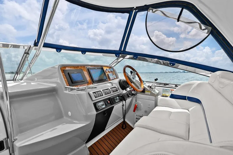 Slide: The Image of Interior of 2008 Formula 40 Performance Cruiser with modern dashboard and ocean view. - 28