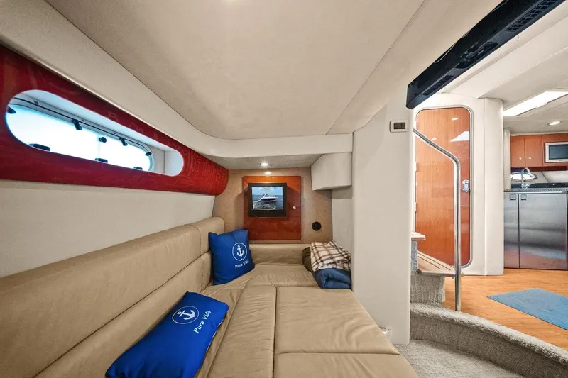 Slide: The Image of Interior of 2008 Formula 40 Performance Cruiser, featuring cozy seating and modern amenities. - 9