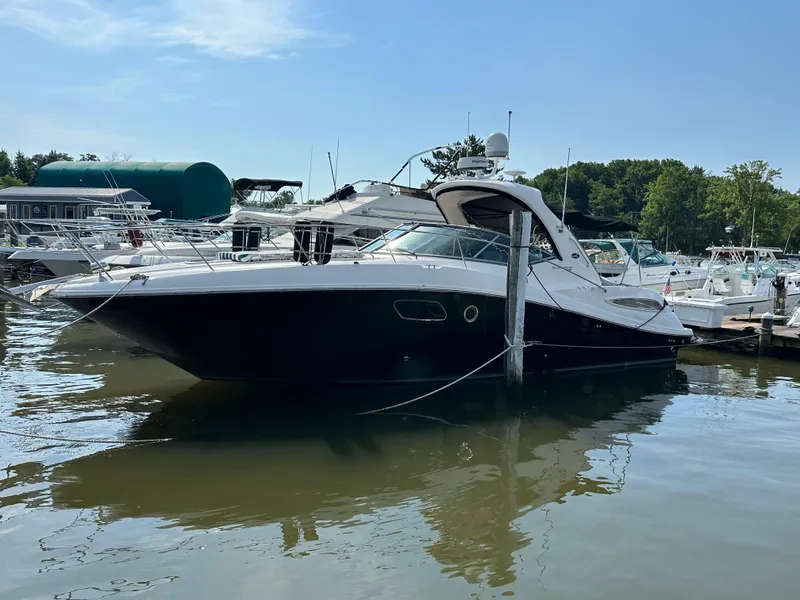 Slide: The Image of 2011 Sea Ray 350 Sundancer yacht docked at marina on a sunny day. - 10