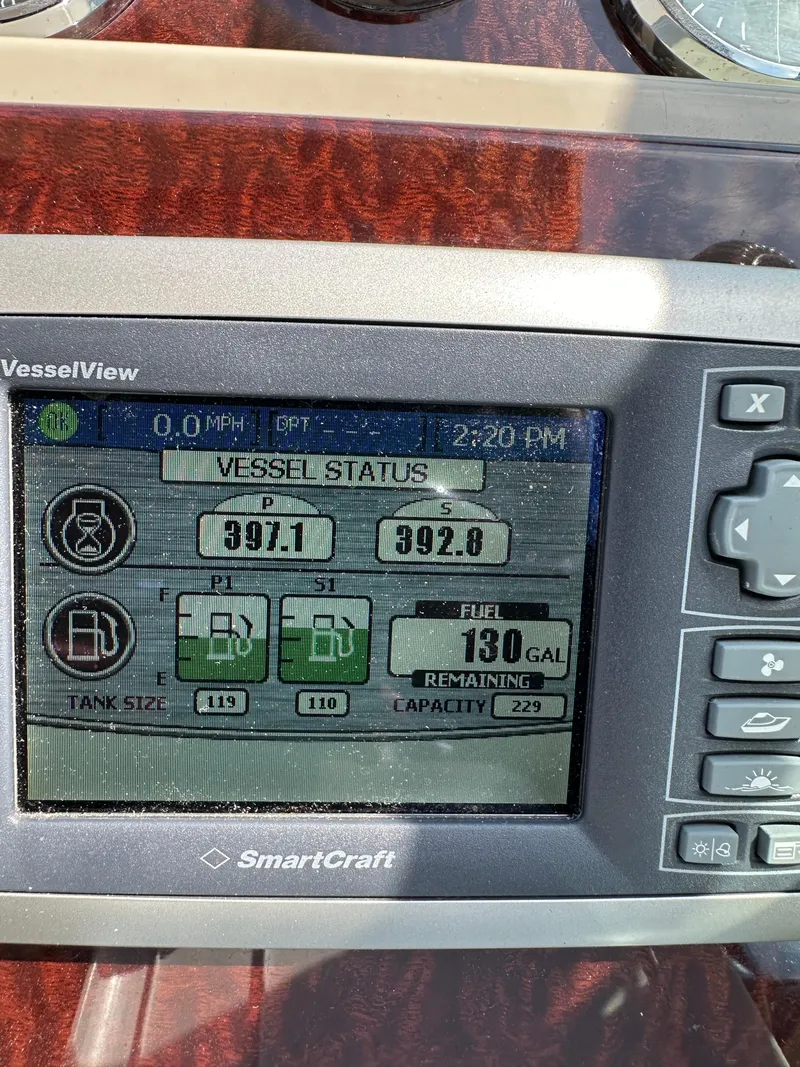 Slide: The Image of SmartCraft VesselView display on 2011 Sea Ray 350 Sundancer showing vessel status and fuel levels. - 30