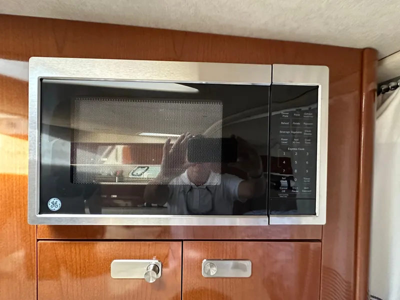 Slide: The Image of GE microwave in 2011 Sea Ray 350 Sundancer yacht kitchen. - 39