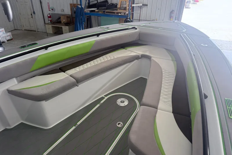 Slide: The Image of Interior of 2019 Statement 350 Open boat with green and gray seating. - 16