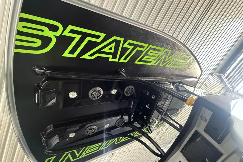 Slide: The Image of 2019 Statement 350 Open boat with bold green lettering, viewed from below. - 17