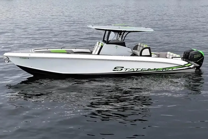 Slide: The Image of 2019 Statement 350 Open boat on calm water, featuring sleek design and modern features. - 2