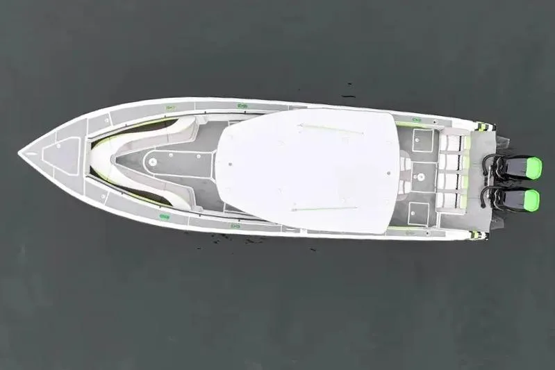 Slide: The Image of Aerial view of 2019 Statement 350 Open boat with dual engines on calm water. - 3