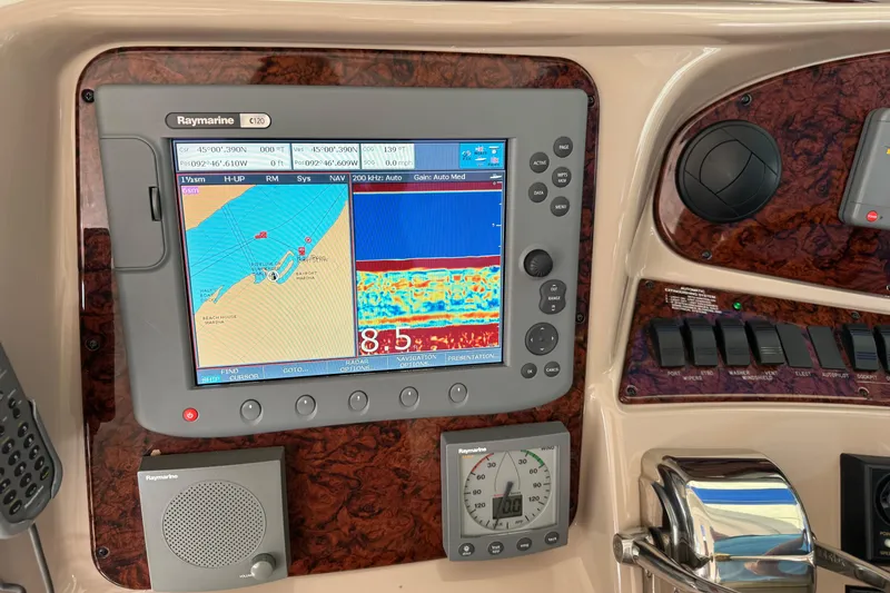 Slide: The Image of Raymarine C120 navigation system on 2004 Sea Ray 390 Motor Yacht dashboard. - 17