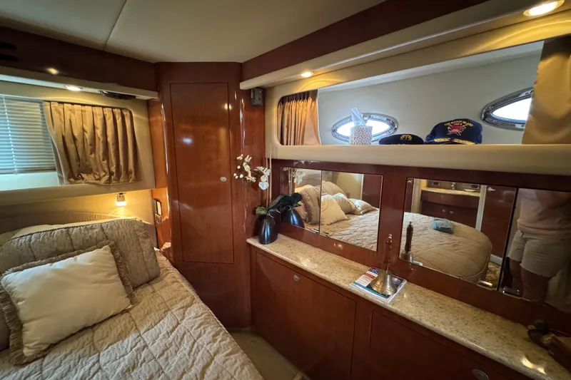 Slide: The Image of Luxurious interior of 2004 Sea Ray 390 Motor Yacht with elegant wood finishes. - 31