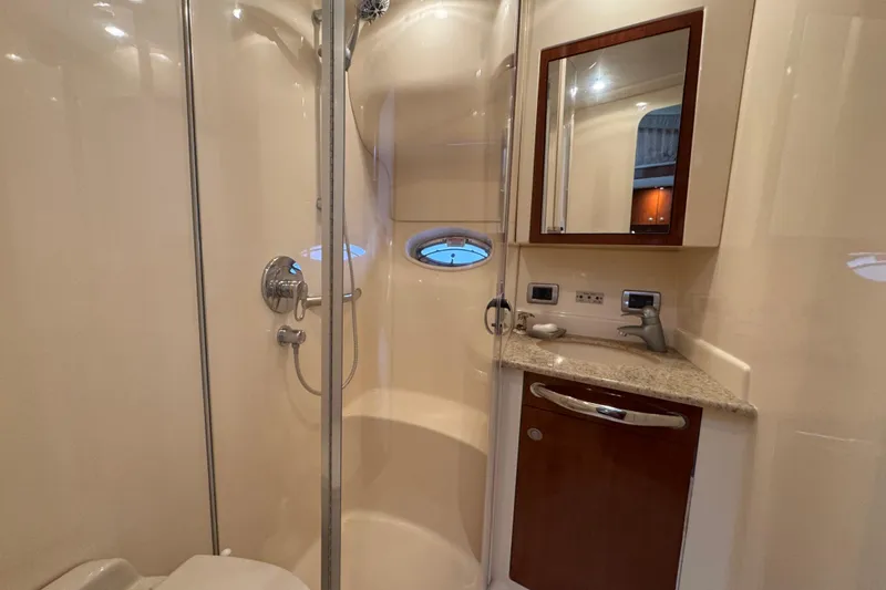 Slide: The Image of Luxurious bathroom in 2004 Sea Ray 390 Motor Yacht with shower and vanity. - 40