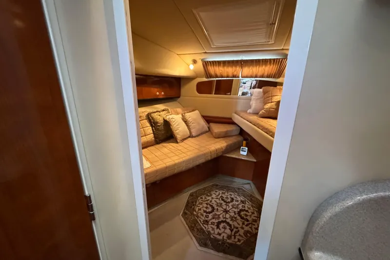 Slide: The Image of Interior of 2004 Sea Ray 390 Motor Yacht with cozy seating and elegant decor. - 41
