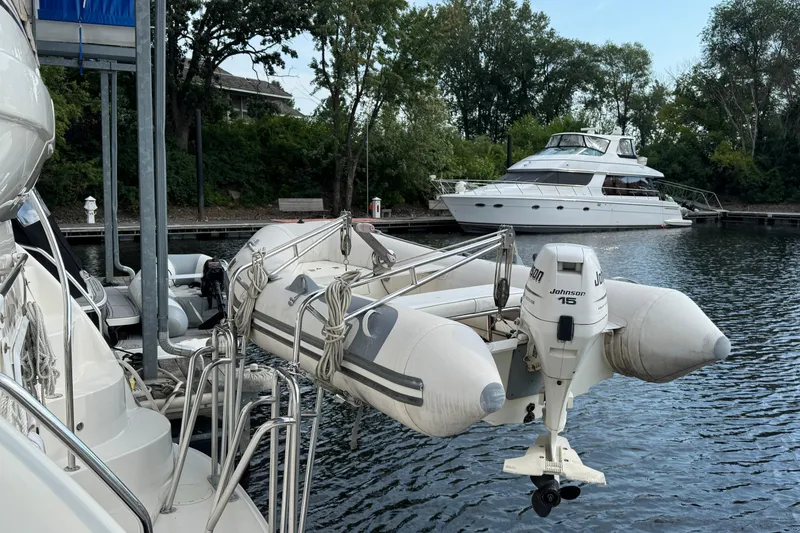 Slide: The Image of 2004 Sea Ray 390 Motor Yacht docked with inflatable boat and Johnson motor. - 5