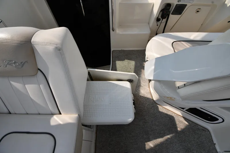 Slide: The Image of Interior of 2011 Sea Ray 310 Sundancer with Igloo cooler storage. - 29