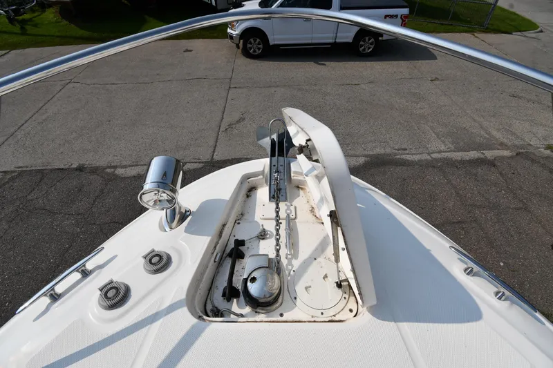 Slide: The Image of Bow view of 2011 Sea Ray 310 Sundancer with anchor and spotlight. - 31