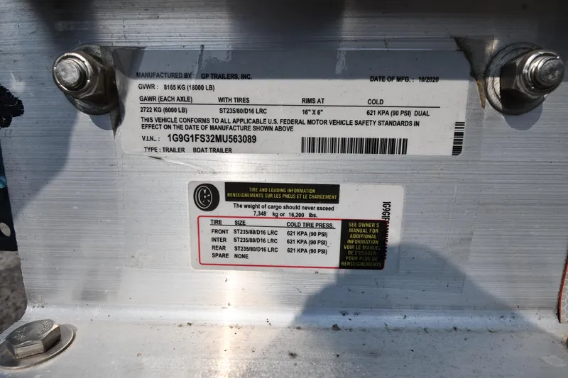 Slide: The Image of Label on a boat trailer showing specifications and safety standards compliance. - 4