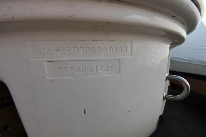 Slide: The Image of Hull identification number on 2011 Sea Ray 310 Sundancer boat. - 7