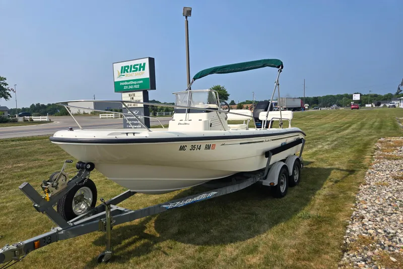 Slide: The Image of 1998 Boston Whaler 18 Dauntless boat on trailer at Irish Boat Shop. - 7