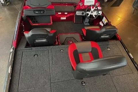 Slide: The Image of 2026 Nitro Z20 XL Pro boat interior with red and black seating and advanced dashboard. - 3