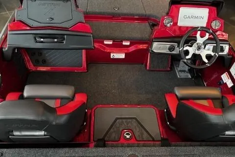 Slide: The Image of 2026 Nitro Z20 XL Pro boat interior with Garmin system, featuring red and black seating. - 4