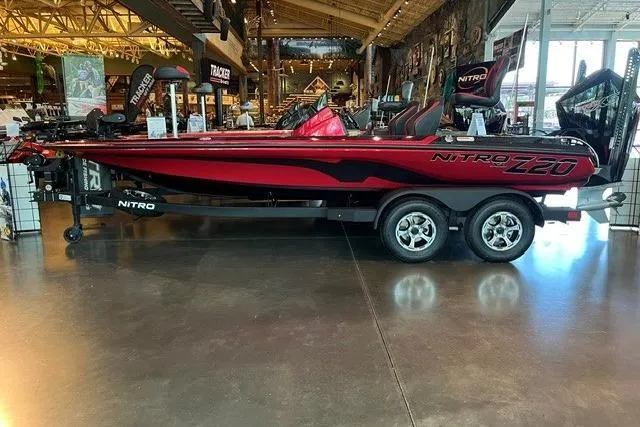 The Image of 2026 Nitro Z20 XL Pro bass boat displayed indoors on a trailer. - 0