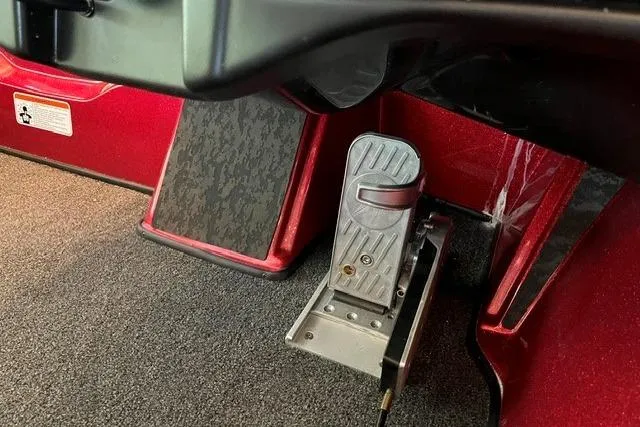 Slide: The Image of Foot pedal of 2026 Nitro Z20 XL Pro boat, featuring sleek red interior design. - 9