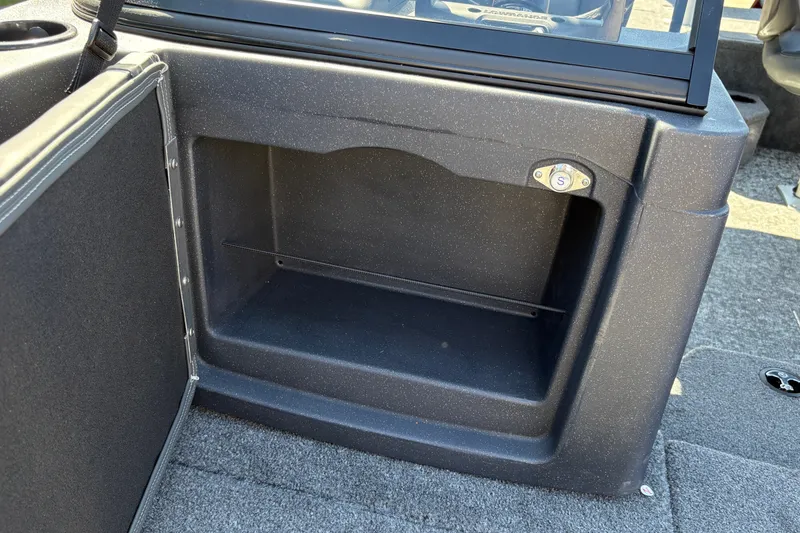 Slide: The Image of Storage compartment in 2026 Tracker Targa V-18 WT boat, featuring secure latch and durable design. - 38