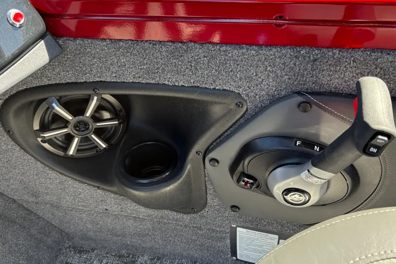 Slide: The Image of 2026 Tracker Targa V-18 WT boat interior with speaker and control lever. - 27