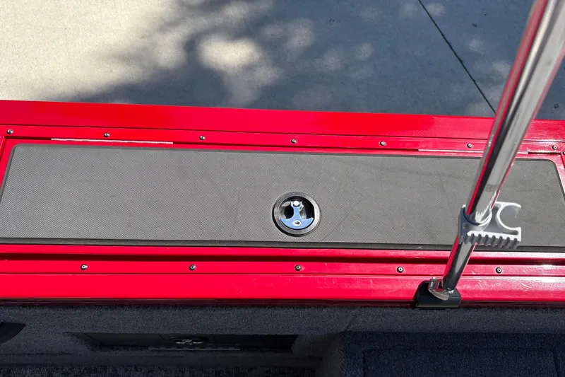 Slide: The Image of Red 2026 Tracker Targa V-18 WT boat deck with mounted pole holder. - 25