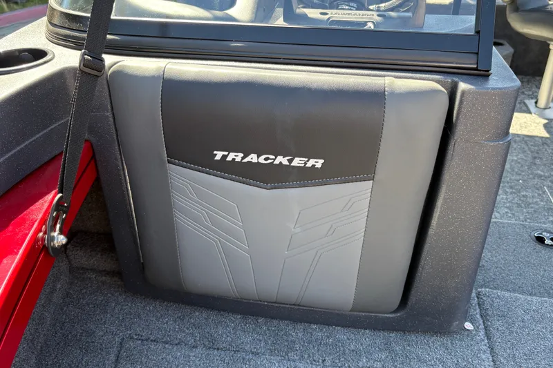 Slide: The Image of 2026 Tracker Targa V-18 WT boat interior detail with logo and seating. - 26