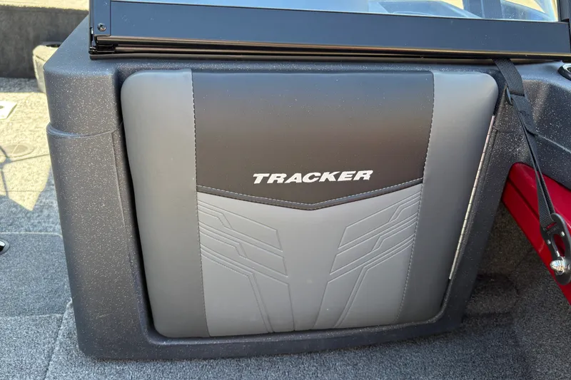 Slide: The Image of 2026 Tracker Targa V-18 WT boat interior detail with logo on seat. - 18