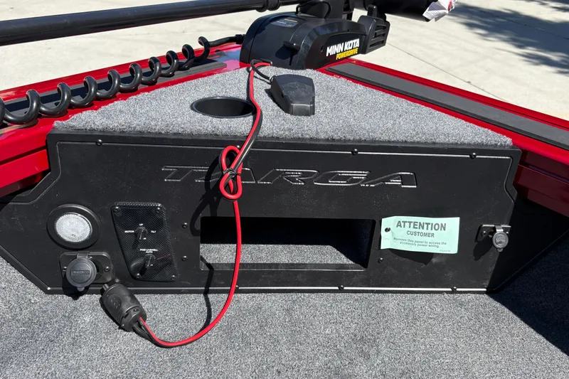 Slide: The Image of 2026 Tracker Targa V-18 WT boat dashboard with Minn Kota PowerDrive motor and control panel. - 42