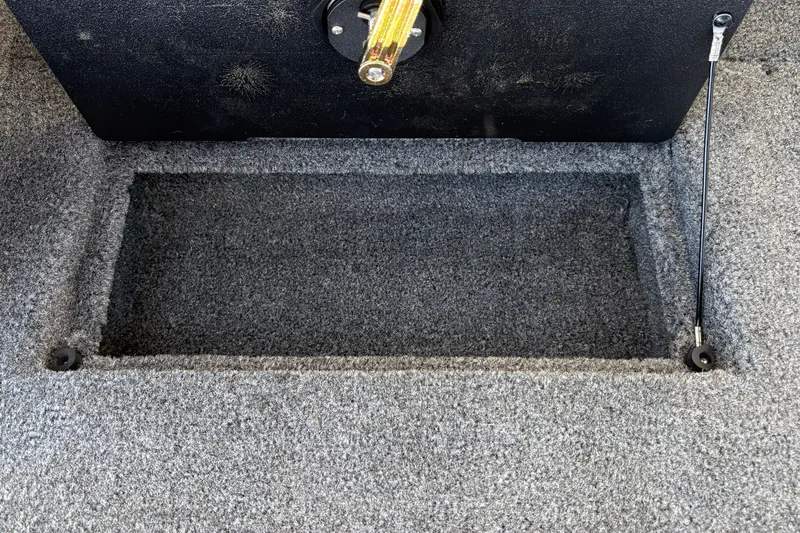 Slide: The Image of Carpeted storage compartment in 2026 Tracker Targa V-18 WT boat interior. - 53