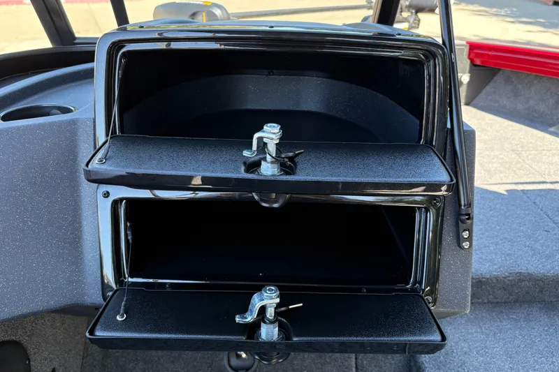 Slide: The Image of 2026 Tracker Targa V-18 WT boat storage compartments with secure latches. - 21