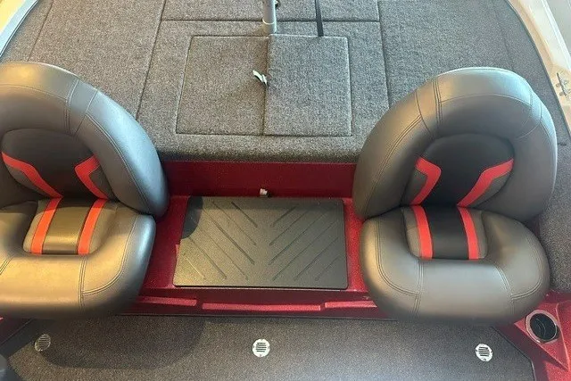 Slide: The Image of 2026 Nitro Z17 boat interior with black and red seats, carpeted flooring. - 7