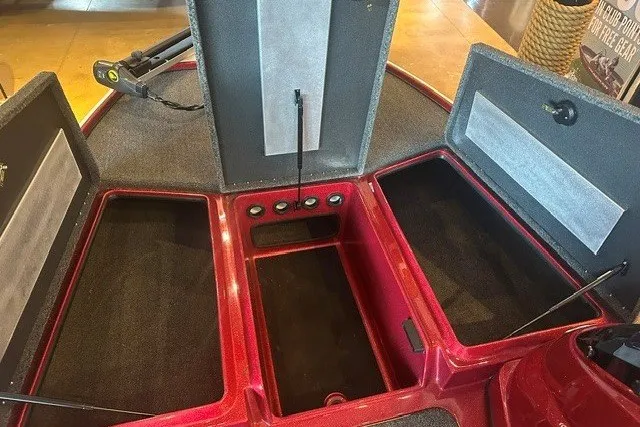 Slide: The Image of Open storage compartments on a 2026 Nitro Z17 boat, showcasing interior space. - 2