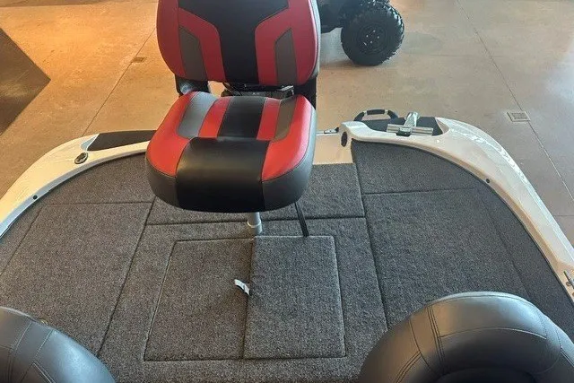 Slide: The Image of Red and black seat on a 2026 Nitro Z17 boat deck. - 4