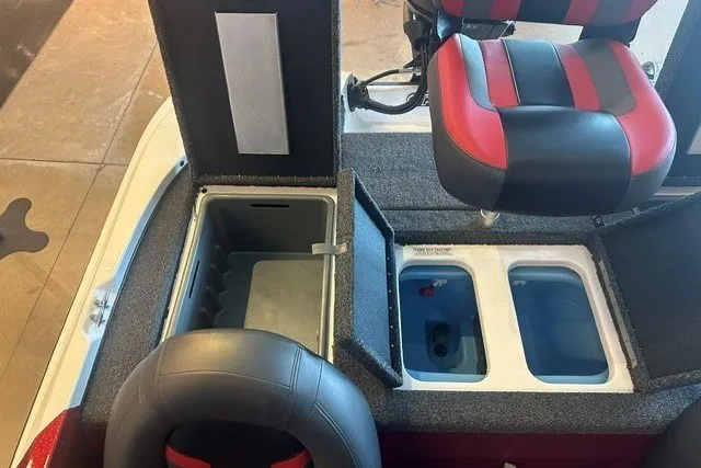 Slide: The Image of 2026 Nitro Z17 boat interior with storage compartments and red-black seating. - 3