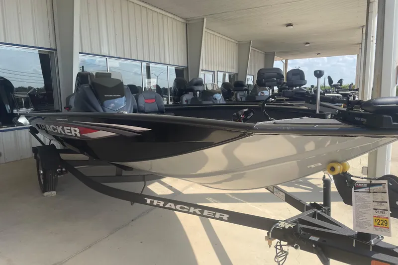 Slide: The Image of 2026 Tracker Pro Team 175 Crappie Edition boat displayed at dealership. - 3