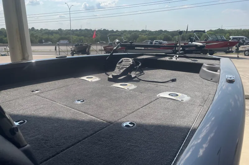 Slide: The Image of 2026 Tracker Pro Team 175 Crappie Edition boat deck with fishing equipment. - 8