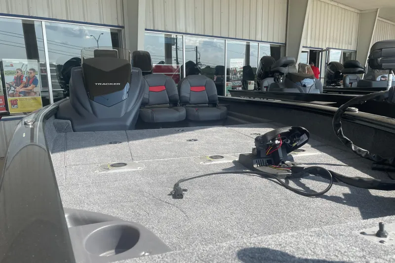 Slide: The Image of 2026 Tracker Pro Team 175 Crappie Edition boat interior with seating and equipment. - 9