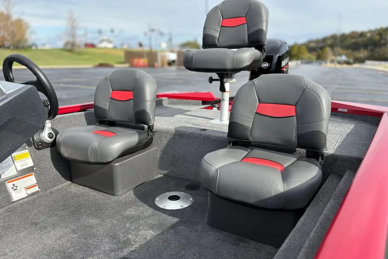 Slide: The Image of 2026 Tracker Pro Team 175 Crappie Edition boat seats, gray with red accents. - 12