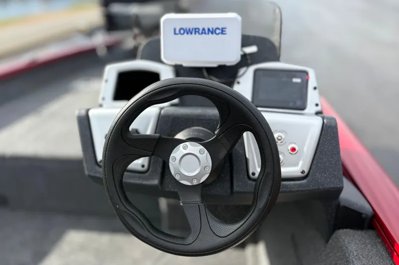 Slide: The Image of Steering wheel and dashboard of 2026 Tracker Pro Team 175 Crappie Edition boat. - 13