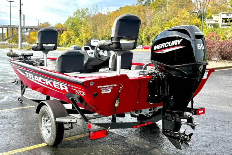 Slide: The Image of 2026 Tracker Pro Team 175 Crappie Edition boat with Mercury 60 engine, parked outdoors. - 6