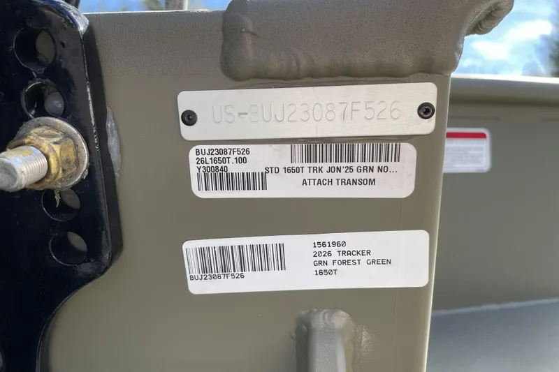 Slide: The Image of 2026 Tracker Grizzly 1650 T Prairie Wings Edition, serial number and labels on transom. - 41