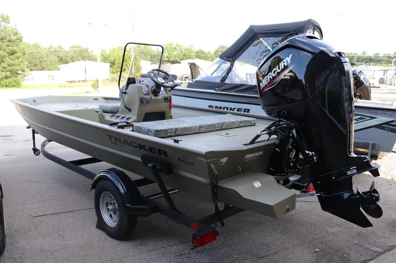 Slide: The Image of 2026 Tracker Grizzly 1860 CC boat with Mercury engine on trailer. - 10