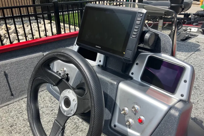 Slide: The Image of Steering console of 2026 Tracker Pro Team 190 boat with Garmin display. - 6