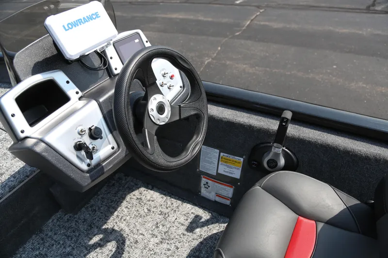 Slide: The Image of 2026 Tracker Pro Team 175 Crappie Edition boat dashboard with Lowrance electronics. - 3