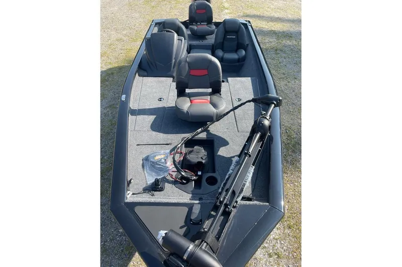 Slide: The Image of 2026 Tracker Pro Team 175 boat with seating and fishing equipment on deck. - 5