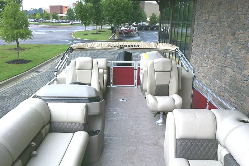 Slide: The Image of 2025 Sun Tracker Party Barge 24 DLX with luxurious seating and spacious deck. - 4