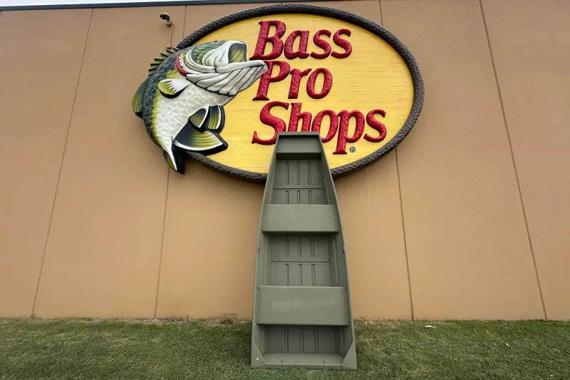 The Image of Tracker Grizzly 12 Jon boat displayed outside Bass Pro Shops, 2026 model. - 0