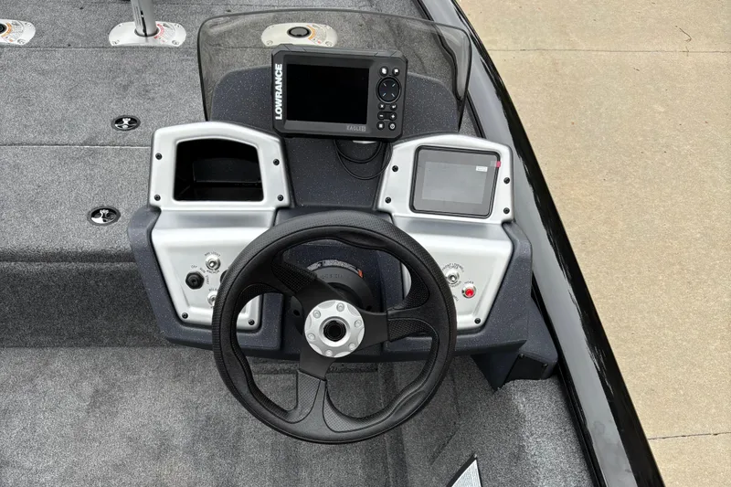 Slide: The Image of Steering console of 2026 Tracker Pro Team 175 Crappie Edition boat with navigation equipment. - 5
